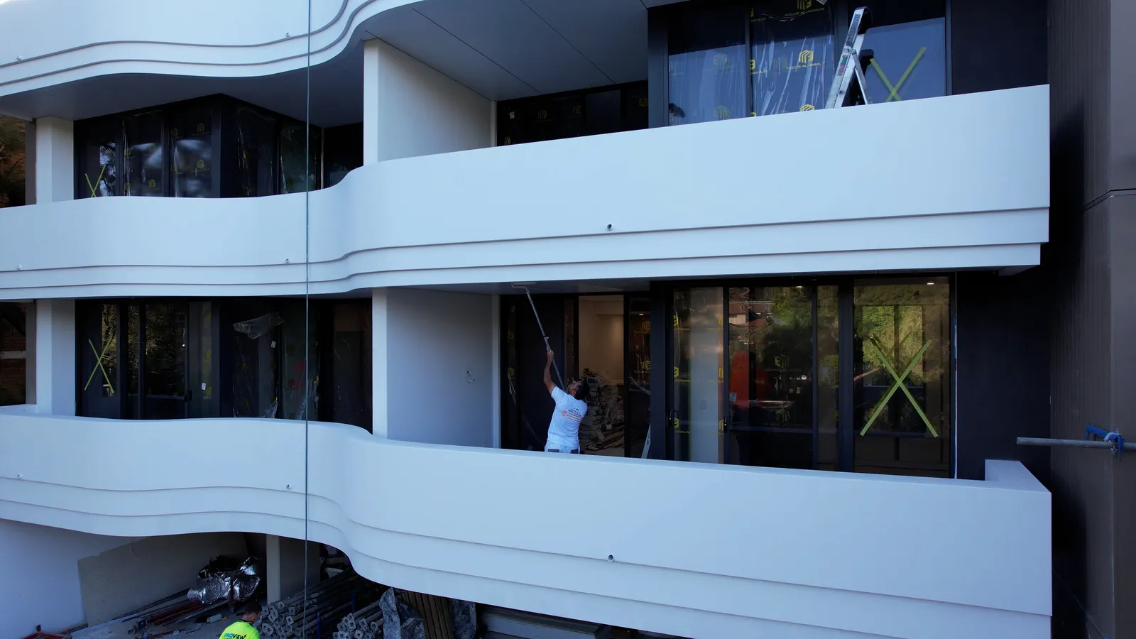 Super Painter team painting a commercial interior